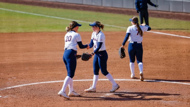 Shelby Barbee and Eden Bigham react during the Virginia softball game against Iowa State at Palmer Park.